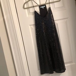 Black sequin spaghetti strap dress.